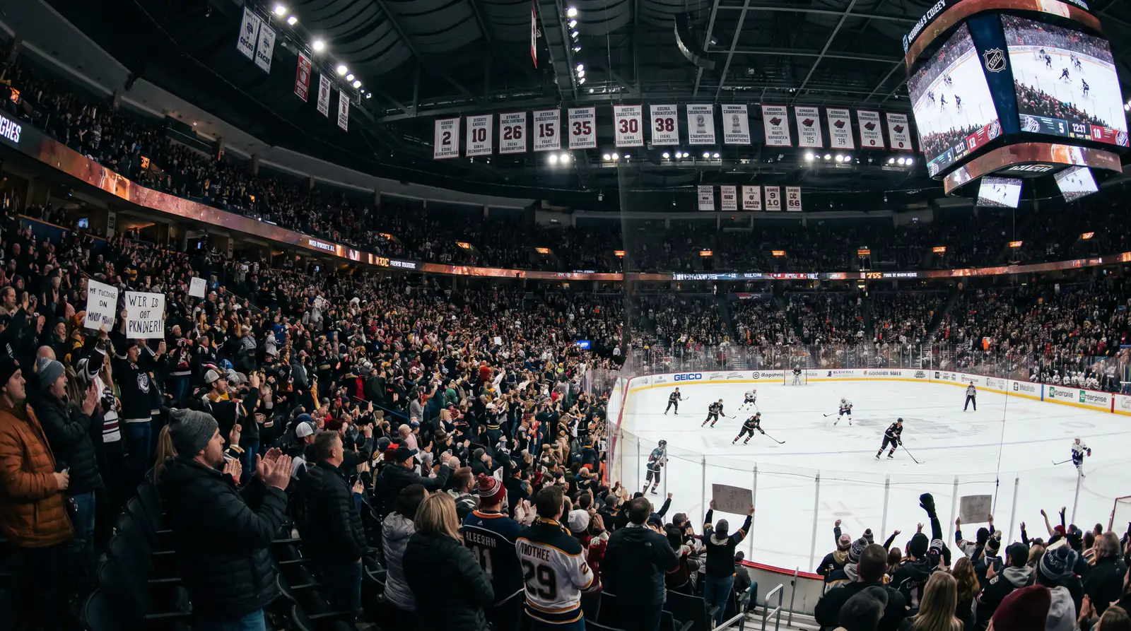 Hockey game in progress during a January mid-season stretch with full arena stands