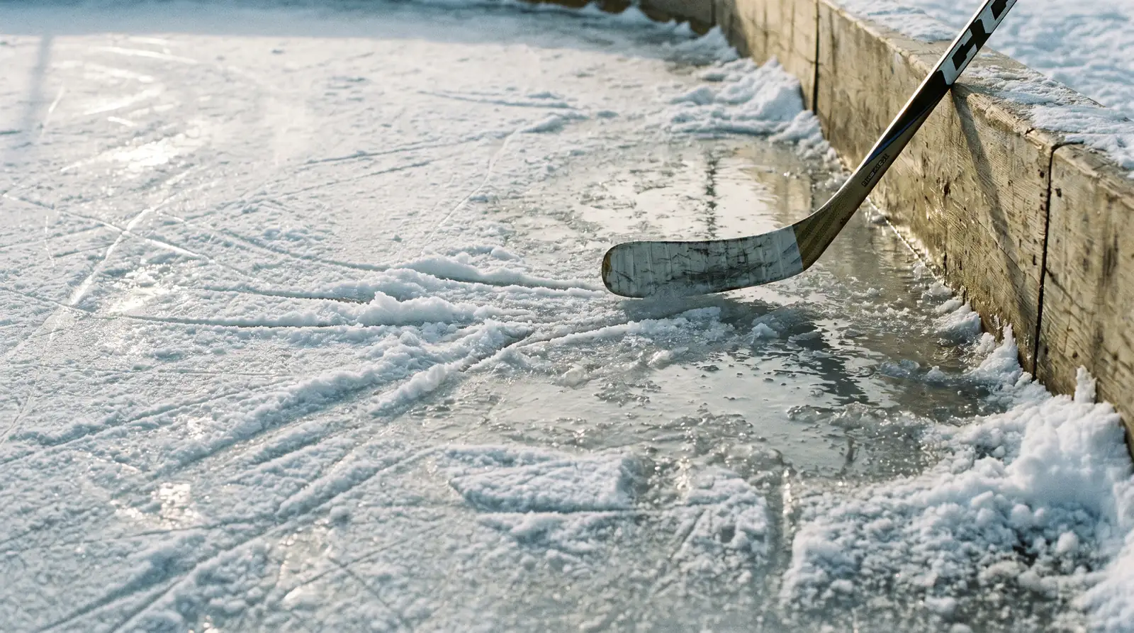 Close view of choppy outdoor ice surface during NHL game