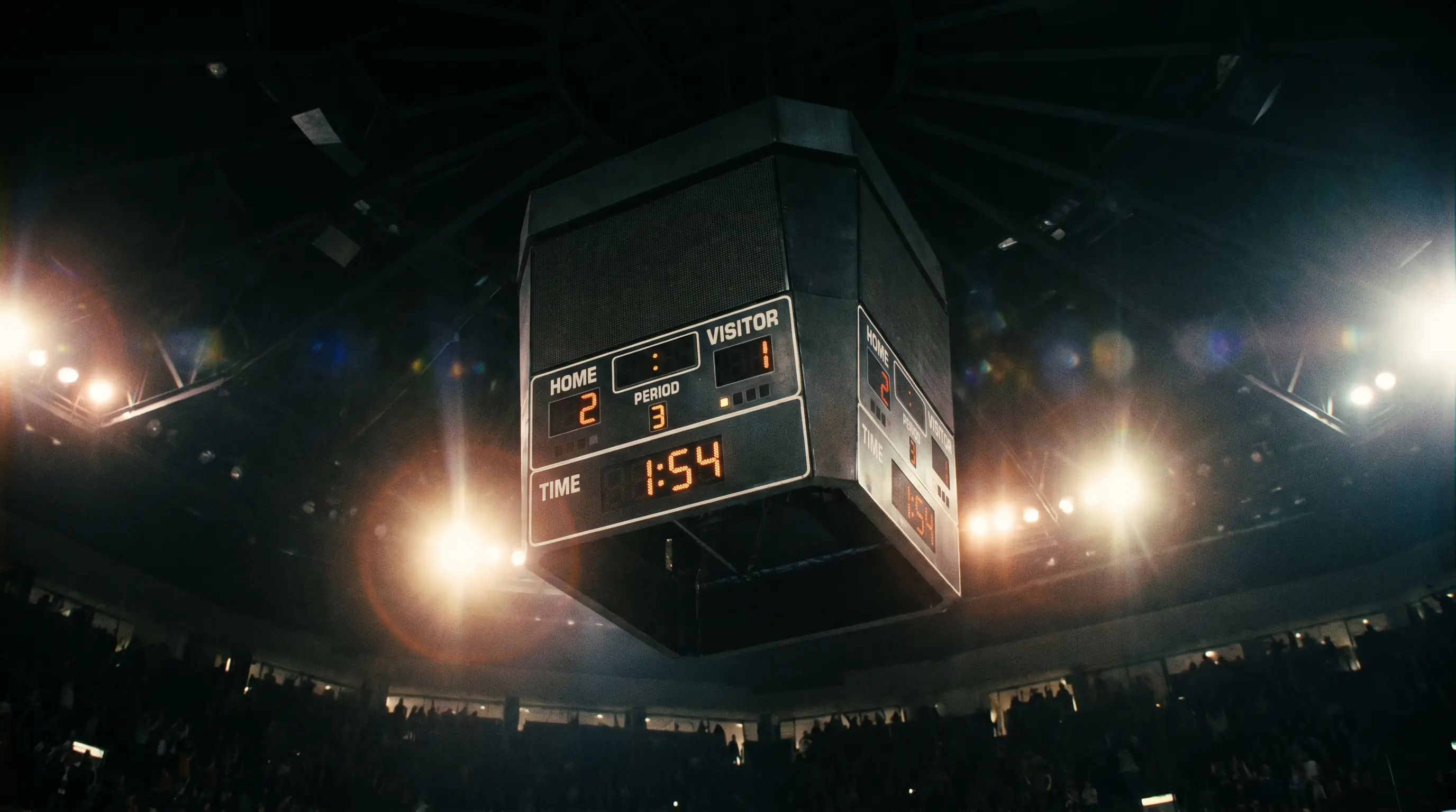 Empty net and scoreboard showing tight playoff game score